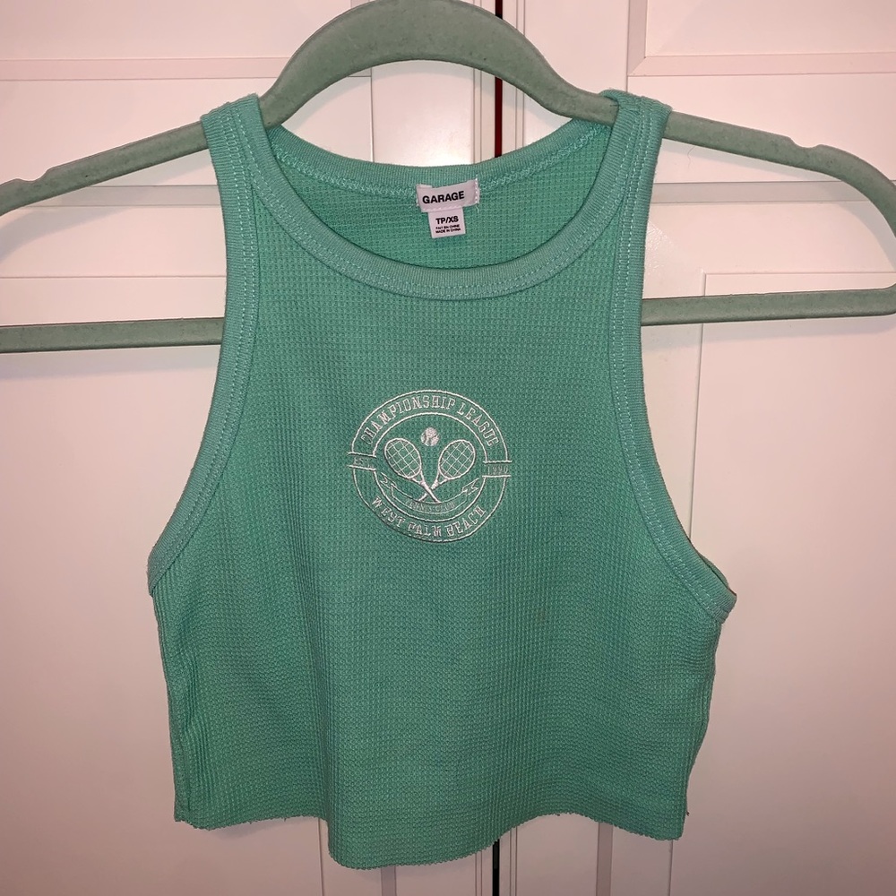 Tight tank top from garage. It’s an XS